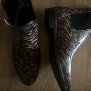 Sleek Brown and Black Ankle Boots with Snakeskin Pattern